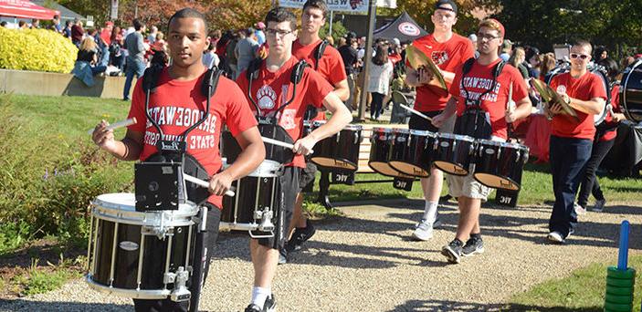 BSU Marching Band drummers leading Homecoming parade